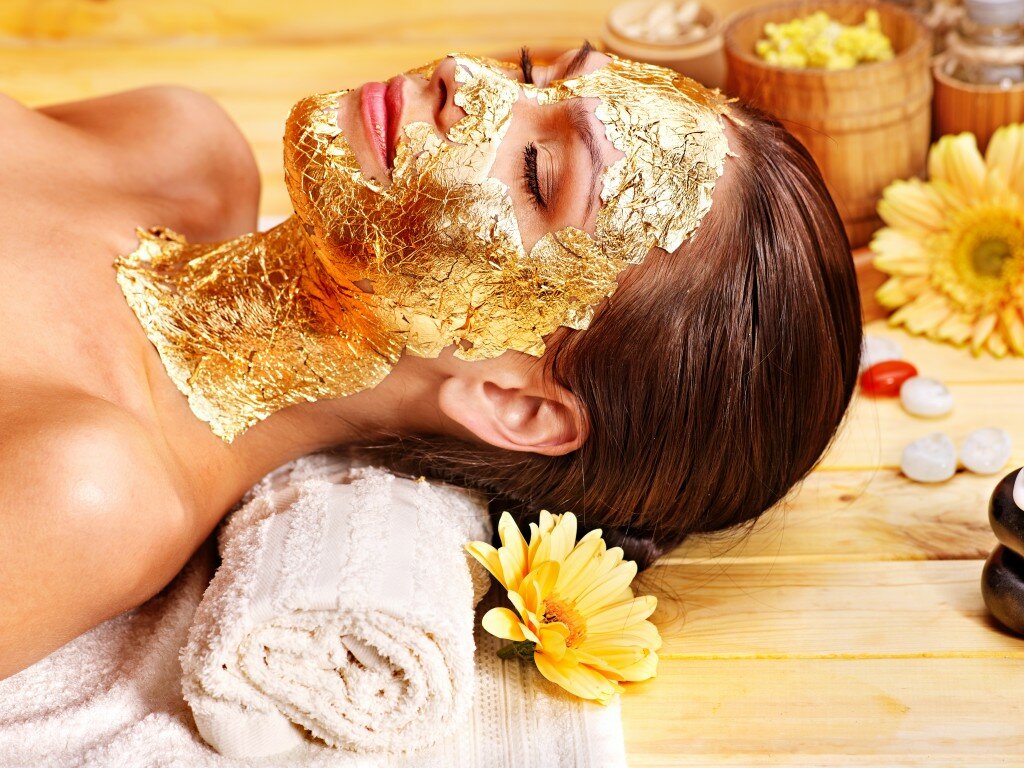 Woman Getting A Gold Facial